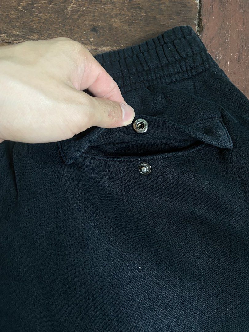 Nike Black Joggers Sweatpants XL (Category: Joggers) located in Manila. Submitted by mavcl (Listing ID 1469698154, Image 3). Description: - Authentic Black Nike Sweatpants - Size: XL - Super warm heavy fleece lining inside - White embroidered swoosh logo on the left leg - Elastic waistband and cuffs for a secure fit - Back pocket with snap button closure - Condition: Brand new with tag attached.