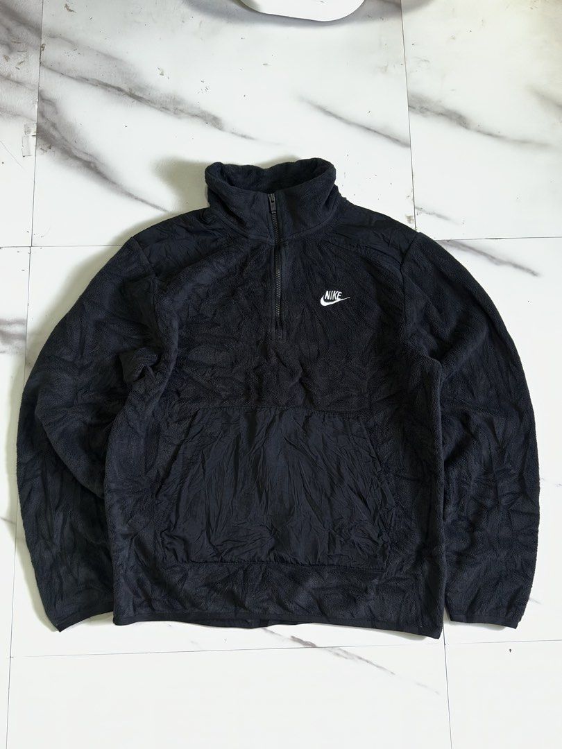 Nike Black Sherpa Fleece 1/4 Zip Pullover (Category: Coats, Jackets and Outerwear) located in Cavite. Submitted by remcadzzz (Listing ID 1469609908, Image 1). Description: - Brand: Nike - Style: Sherpa Fleece Half-Zip Sweatshirt - Style Code: DD4870-010 - Color: Black with white embroidered chest logo - Size: Small on tag but best fit M to Semi Large - Origin: Made in Vietnam - Features: Front kangaroo pocket, super cozy and warm material ideal f