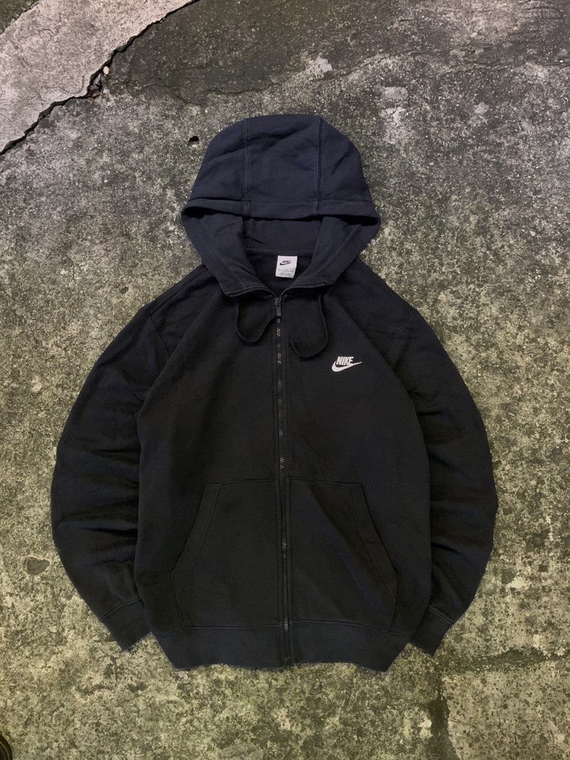 Nike Black Zip-Up Hoodie (Category: Hoodies) located in Manila. Submitted by thrift2mnla (Listing ID 1469681059, Image 1). Description: - Brand: Nike - Style: Zip-up hoodie with drawstring hood and front pouch pockets - Size: 2XL - Color: Black with classic white embroidered swoosh on left chest - Origin: Made in China - SF via J&T or Gogo Express - Mode of Payment: GCash, Bank Transfer, or COD.