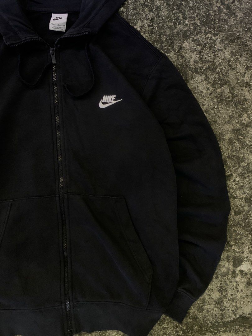 Nike Black Zip-Up Hoodie (Category: Hoodies) located in Manila. Submitted by thrift2mnla (Listing ID 1469681059, Image 3). Description: - Brand: Nike - Style: Zip-up hoodie with drawstring hood and front pouch pockets - Size: 2XL - Color: Black with classic white embroidered swoosh on left chest - Origin: Made in China - SF via J&T or Gogo Express - Mode of Payment: GCash, Bank Transfer, or COD.