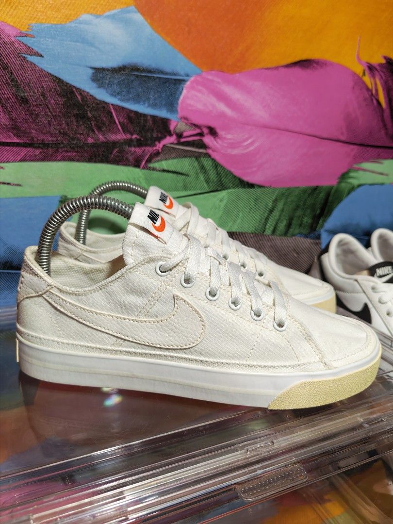 Nike Court Legacy Canvas (Category: Sneakers) located in Dulag. Submitted by konswelosesilyamariya18 (Listing ID 1469608332, Image 2). Description: - Brand: Nike - Model: CZ0294-100 - Style: Low-top canvas sneakers with white leather swoosh & orange tongue branding - Size: US 7 / UK 4.5 / EUR 38 / 24 CM - Details: Rubber toe caps and textured midsoles - Condition: Clean uppers and soles overall - Manufactured: Vietnam (2021).