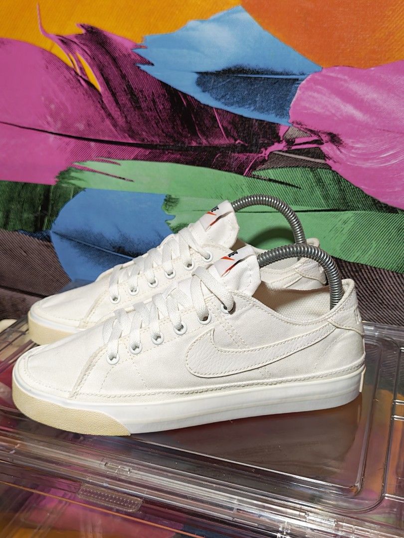 Nike Court Legacy Canvas (Category: Sneakers) located in Dulag. Submitted by konswelosesilyamariya18 (Listing ID 1469608332, Image 1). Description: - Brand: Nike - Model: CZ0294-100 - Style: Low-top canvas sneakers with white leather swoosh & orange tongue branding - Size: US 7 / UK 4.5 / EUR 38 / 24 CM - Details: Rubber toe caps and textured midsoles - Condition: Clean uppers and soles overall - Manufactured: Vietnam (2021).
