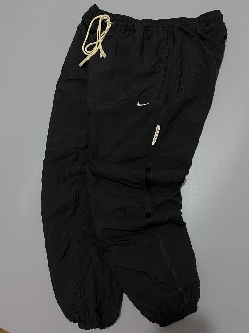 Nike Dri-FIT Standard Issue Black Pants (Category: Joggers) located in Manila. Submitted by urboycee (Listing ID 1469711277, Image 2). Description: - Brand: Nike - Model: Dri-FIT Standard Issue - Color: Black - Size: 3XL (Made in Vietnam) - Features: Elastic drawstring waistband, iconic white Nike swoosh, lightweight and breathable material - Condition: Excellent, well-maintained.