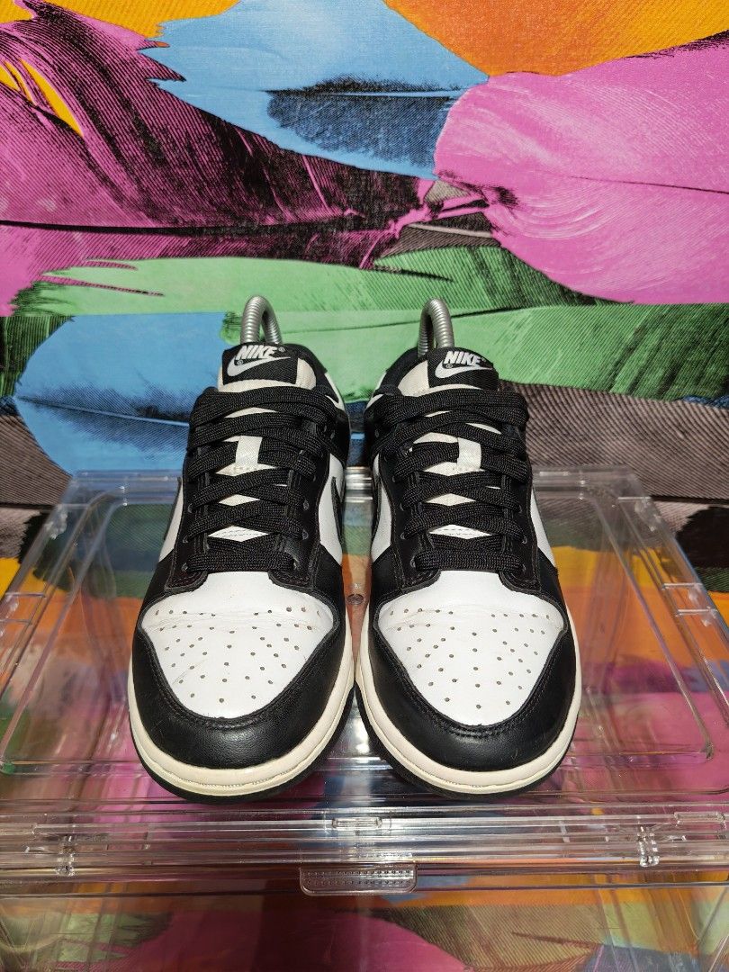 Nike Dunk Low Panda DD1503-101 (Category: Sneakers) located in Dulag. Submitted by konswelosesilyamariya18 (Listing ID 1469609075, Image 3). Description: - Model: Nike Dunk Low 'Panda' (Classic Black and White) - Size: UK 4 / EUR 37.5 / 23.5 cm - Condition: Uppers are clean with light creasing near the toe box; soles show minor dirt from normal use - Features: Premium leather upper, perforated toe box, and durable rubber outsole - Status: 100% re