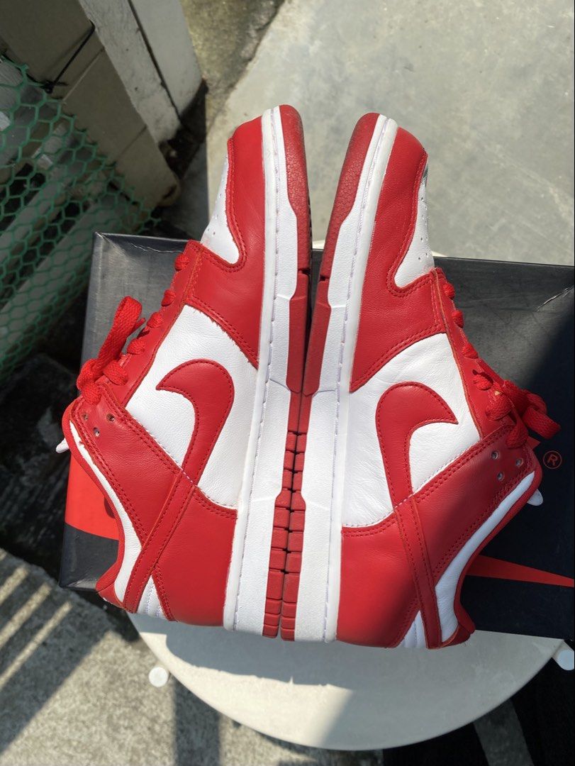 Nike Dunk Low University Red (Category: Sneakers) located in Quezon City. Submitted by ra.collezione (Listing ID 1469602091, Image 2). Description: - Brand: Nike Dunk Low - Colorway: University Red / White - Condition: Worn a few times, minimal crease on the toebox, bottoms are clean - Inclusions: Original laces, shoebox, and shoe trees - Size 8.