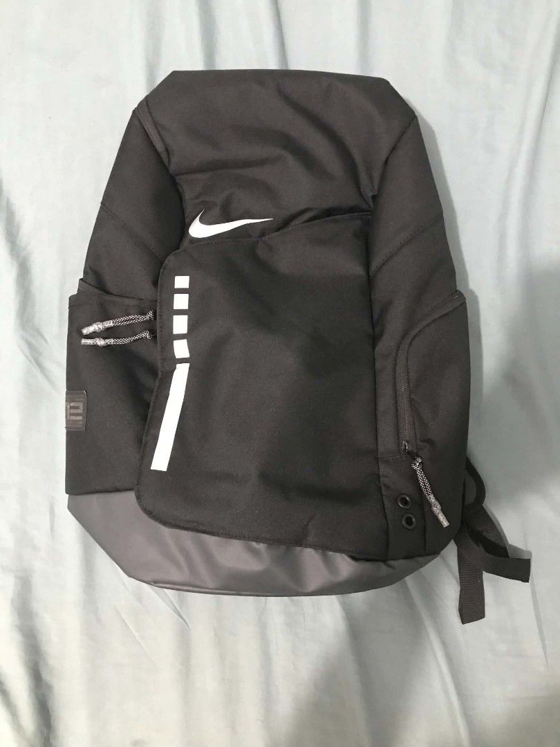Nike Hoops Elite Basketball Backpack Black (Category: Backpacks) located in Muntinlupa City. Submitted by royalstone.53e03d (Listing ID 1469722898, Image 1). Description: - Authentic Nike Elite basketball backpack in Black/Grey - Max Air cushioning on straps for heavy gear comfort - Multiple secure zip compartments & side water bottle pockets - Durable, water-resistant bottom panel - Clean condition inside and out - Versatile for school, gym, or 