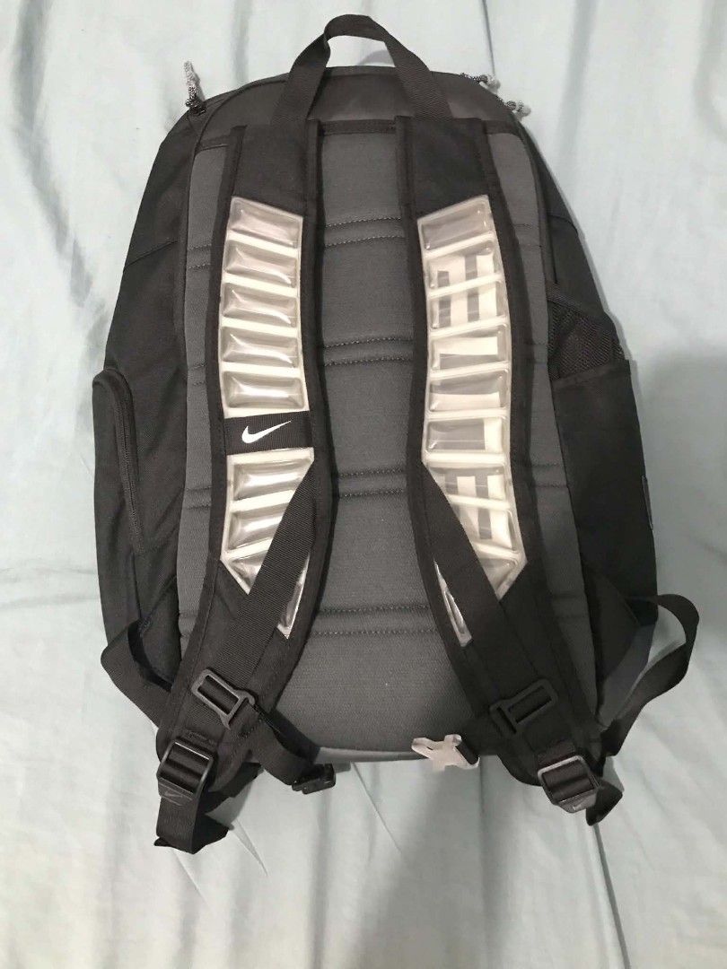 Nike Hoops Elite Basketball Backpack Black (Category: Backpacks) located in Muntinlupa City. Submitted by royalstone.53e03d (Listing ID 1469722898, Image 2). Description: - Authentic Nike Elite basketball backpack in Black/Grey - Max Air cushioning on straps for heavy gear comfort - Multiple secure zip compartments & side water bottle pockets - Durable, water-resistant bottom panel - Clean condition inside and out - Versatile for school, gym, or 