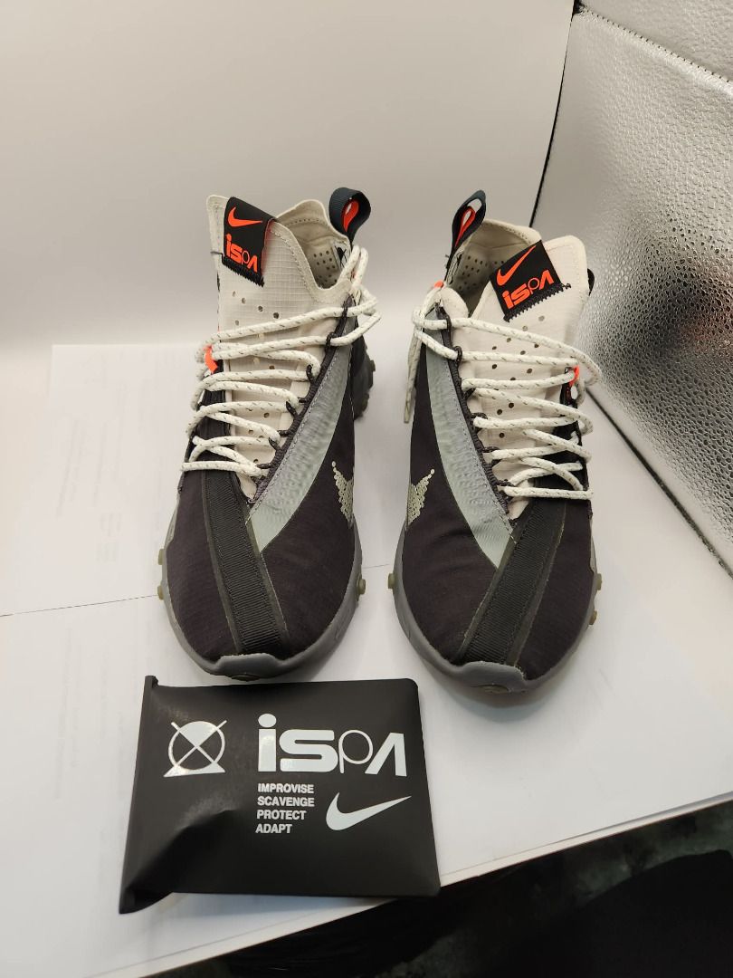 Nike ISPA React Low Size 6.5 US Mens (Category: Sneakers) located in Muntinlupa City. Submitted by redscarlet (Listing ID 1469687812, Image 1). Description: - Model: Nike ISPA React Low - Colorway: Black, grey, and white with vibrant orange accents - Size: US 6.5 -original extra lace included -no box .