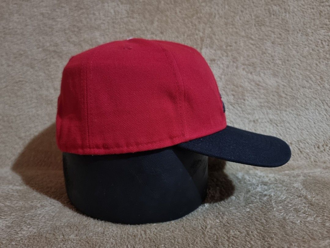 Nike Jordan Pro Jumpman Snapback Cap (Category: Caps & Hats) located in Imus. Submitted by aim_for_less (Listing ID 1469754643, Image 2). Description: Nike Jordan Pro Jumpman Snapback Cap - Brand: Jordan - Style: Classic two-tone snapback cap - Colors: Vibrant red crown with a black flat brim - Details: Iconic black embroidered Jumpman logo on the front - Fit: Adjustable snap closure at the back with small Jordan branding tab - Condition: Clean s