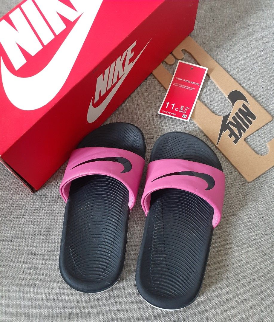 Nike Kids Kawa Slides (Category: Slippers and slides) located in Manila. Submitted by comercio (Listing ID 1469634266, Image 1). Description: Nike Kids Kawa slides Laser Fuchsia, Black, and White Size: US 11C / UK 10.5 / EUR 28 / BR 27 / 17 cm.