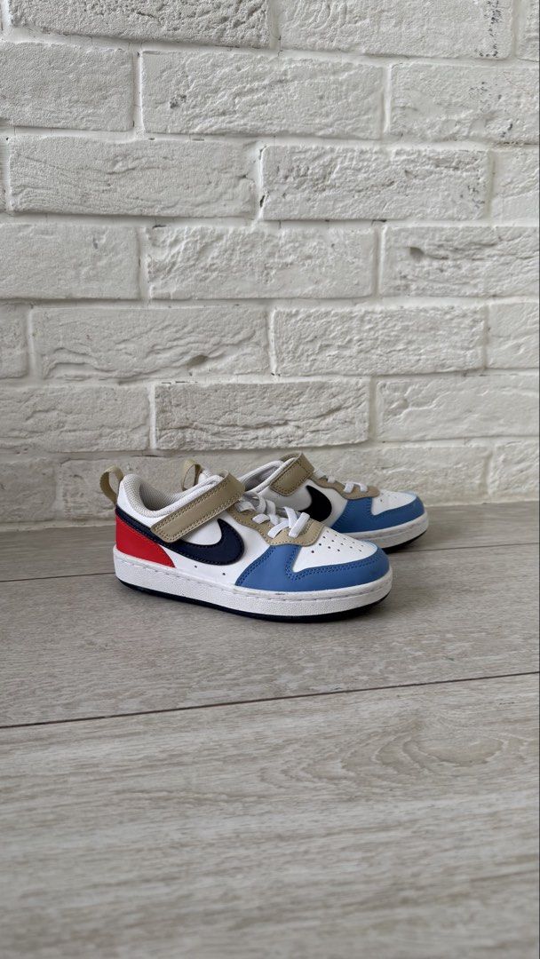 Nike Kids Shoes Size 12C (Category: Babies & Kids Fashion) located in Taguig. Submitted by closet_shoppe (Listing ID 1469758321, Image 1). Description: Kids Nike sneakers, colorful multi-panel design with blue, red, tan, and black. Velcro strap over elastic laces for easy wear. Pull tab at the back. Non-marking rubber outsoles with good grip. Size US 12C. Clean insoles with Nike graphics..