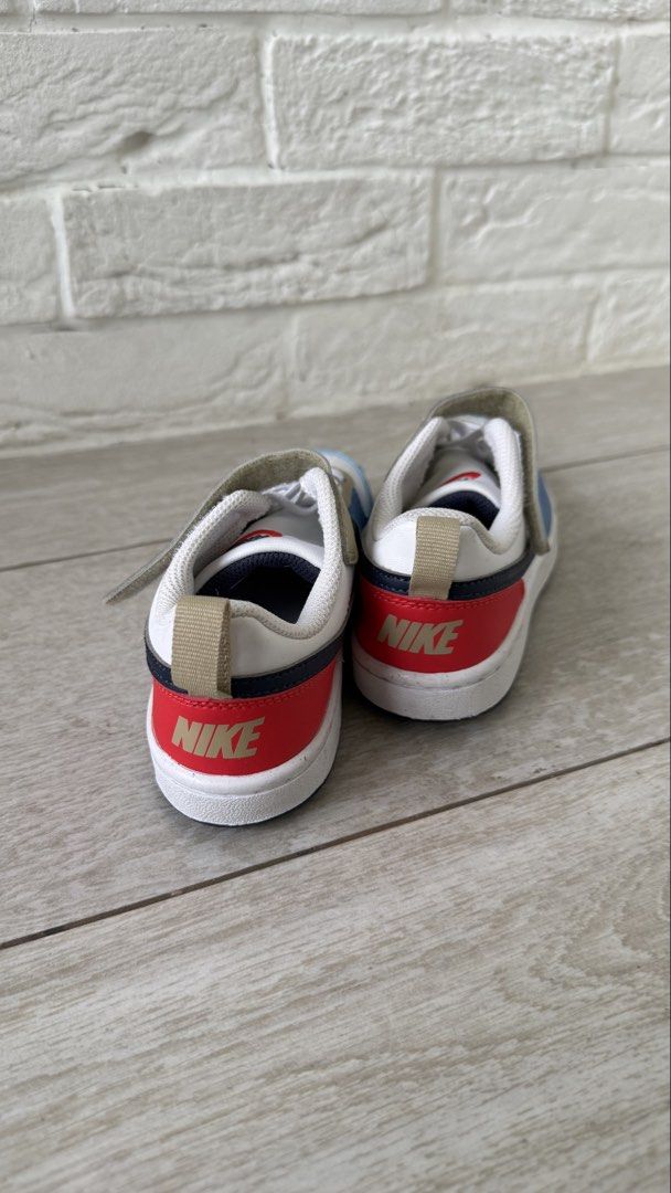 Nike Kids Shoes Size 12C (Category: Babies & Kids Fashion) located in Taguig. Submitted by closet_shoppe (Listing ID 1469758321, Image 3). Description: Kids Nike sneakers, colorful multi-panel design with blue, red, tan, and black. Velcro strap over elastic laces for easy wear. Pull tab at the back. Non-marking rubber outsoles with good grip. Size US 12C. Clean insoles with Nike graphics..
