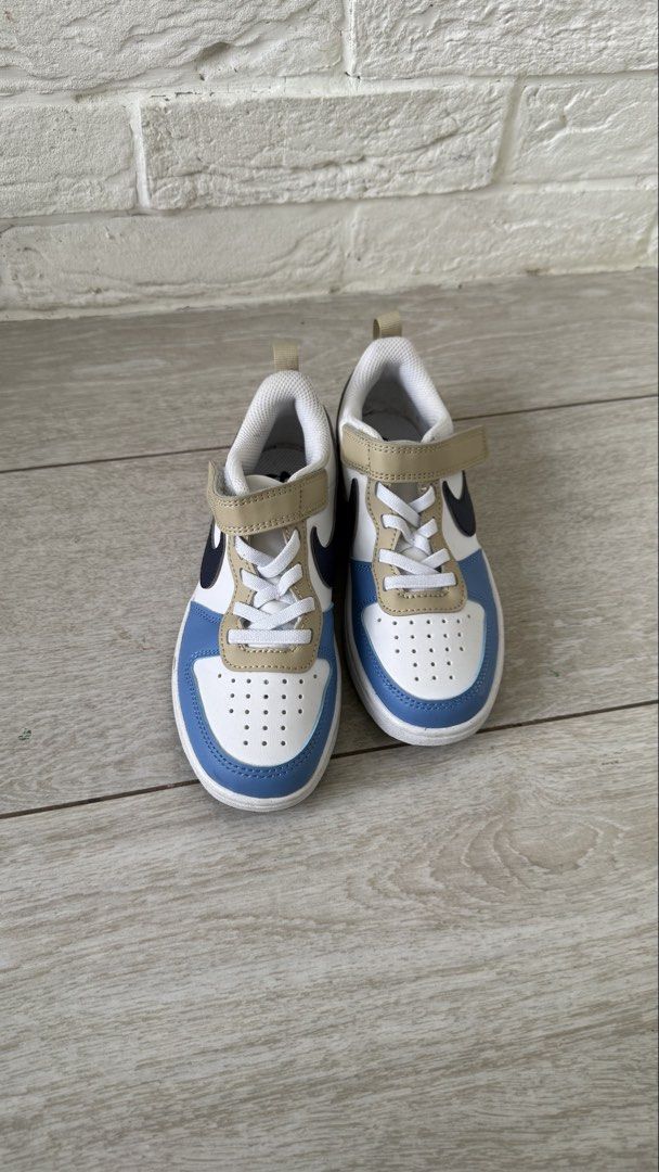 Nike Kids Shoes Size 12C (Category: Babies & Kids Fashion) located in Taguig. Submitted by closet_shoppe (Listing ID 1469758321, Image 2). Description: Kids Nike sneakers, colorful multi-panel design with blue, red, tan, and black. Velcro strap over elastic laces for easy wear. Pull tab at the back. Non-marking rubber outsoles with good grip. Size US 12C. Clean insoles with Nike graphics..