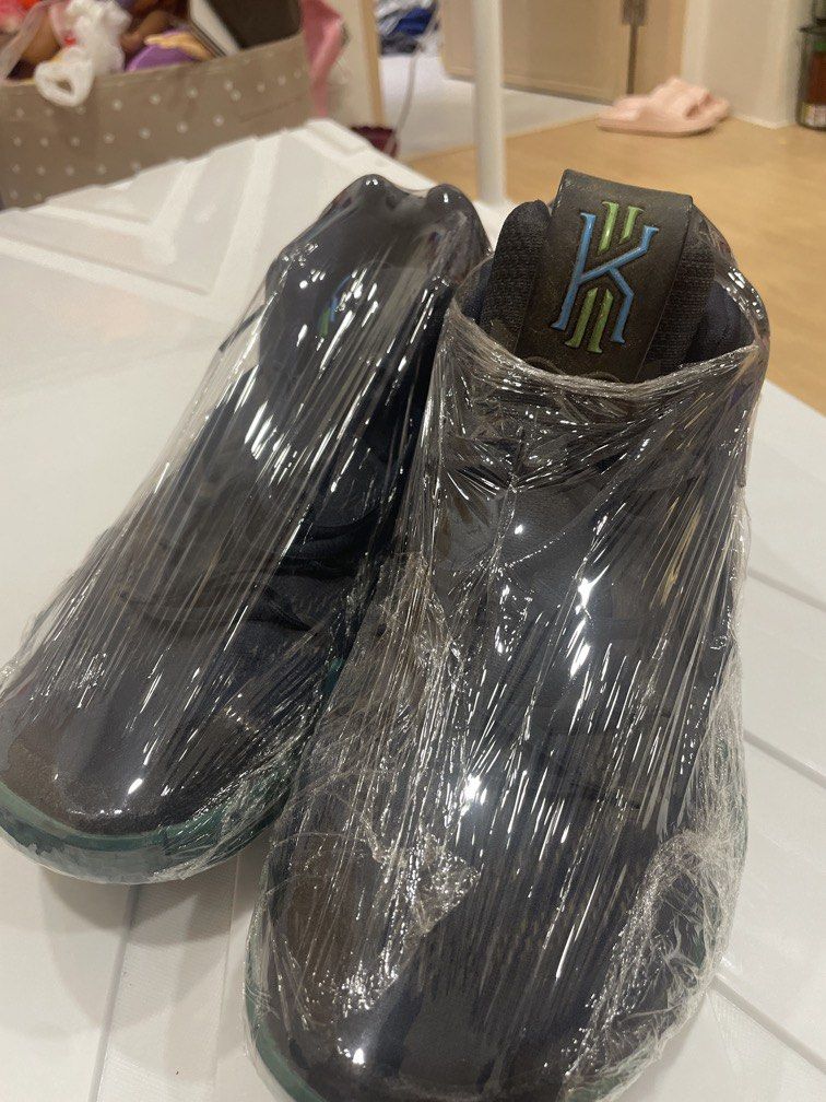 Nike Kyrie IV Obsidian (Category: Sneakers) located in Manila. Submitted by bedlambuzz (Listing ID 1469677755, Image 2). Description: WYSIWYT USED AND ROCKED NO BOX WRAPPED FOR PROTECTION AND STORED WILL NOT UNWRAP FOR PICS.