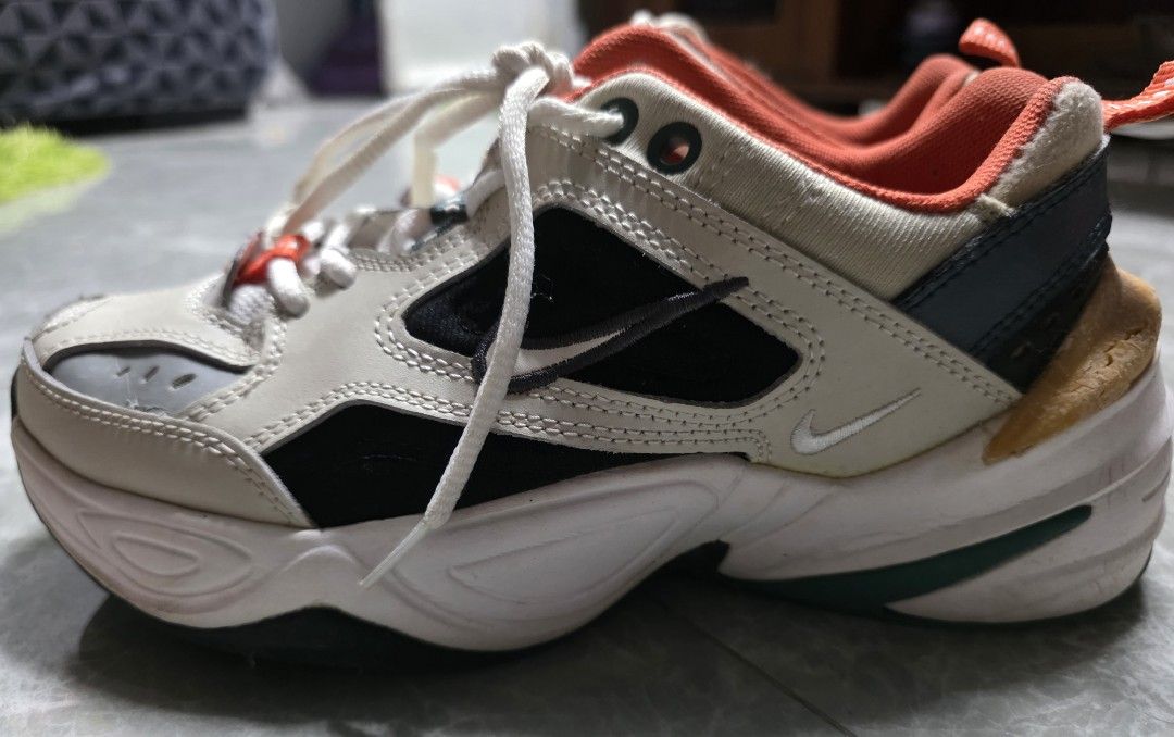 Nike M2K Techno Size 37 (Category: Sneakers) located in Manila. Submitted by littleclosetfindsmnl (Listing ID 1469686903, Image 2). Description: Nike Chunky Sneakers 🧡🖤 -Classic dad shoe silhouette in white, black, grey, and orange. -Size US 6.5 / EUR 37.5. - Well-used - Orange jelly detail has deteriorated due to age; inner/heel fabric is worn out. - Leather uppers and other details remain intact. - Original box included. 💌 Open to reasonable
