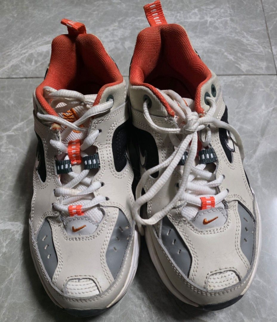 Nike M2K Techno Size 37 (Category: Sneakers) located in Manila. Submitted by littleclosetfindsmnl (Listing ID 1469686903, Image 1). Description: Nike Chunky Sneakers 🧡🖤 -Classic dad shoe silhouette in white, black, grey, and orange. -Size US 6.5 / EUR 37.5. - Well-used - Orange jelly detail has deteriorated due to age; inner/heel fabric is worn out. - Leather uppers and other details remain intact. - Original box included. 💌 Open to reasonable
