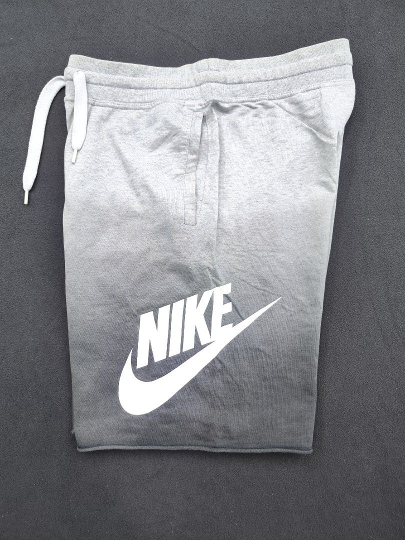 Nike NSW Alumni 2 Tone Shorts (Category: Shorts) located in Bulacan. Submitted by emilj23 (Listing ID 1469596517, Image 1). Description: Nike NSW Alumni 2 Tone Shorts Size L on tag L 21.5 W 32-36 Leg Hole 12 Condition 9/10 Color rate 9/10 Issue Minimal Stain,Slight Fade on Knee Part.