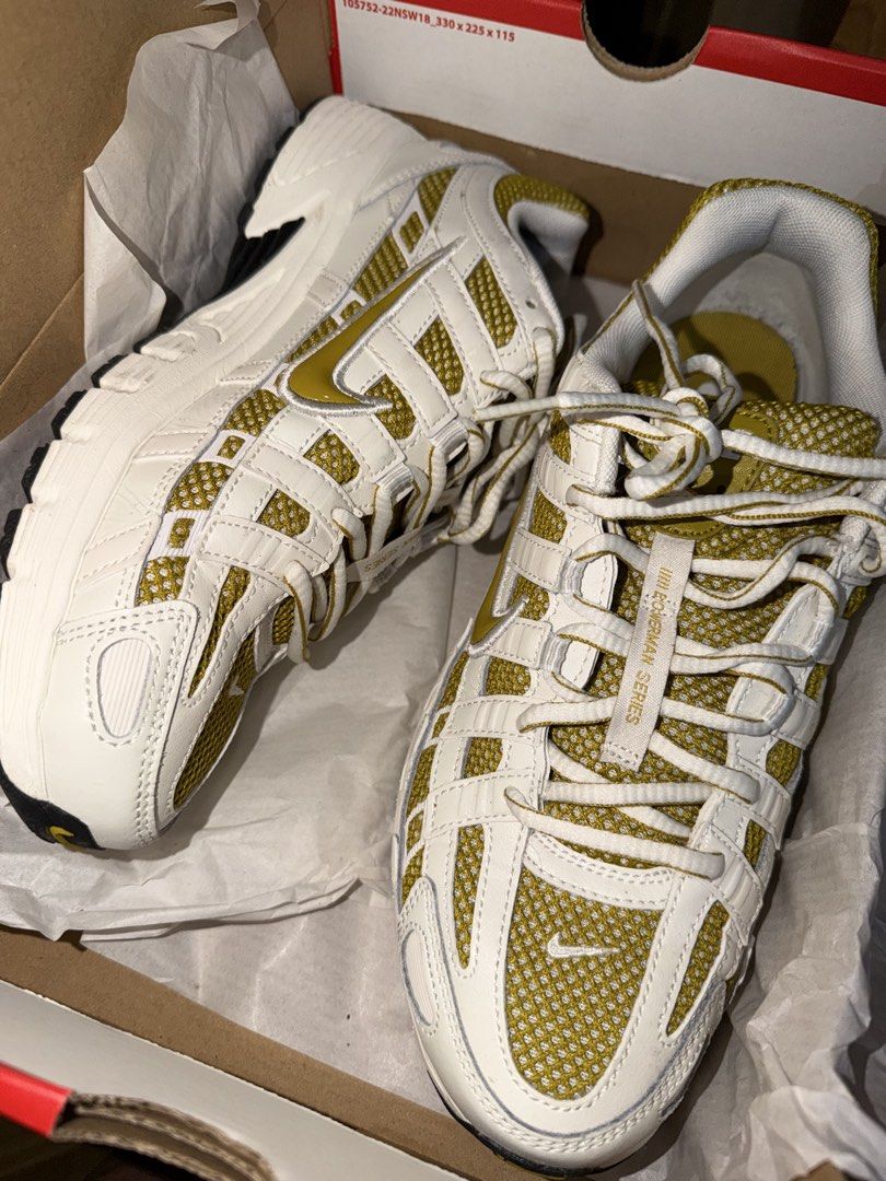 Nike P-6000 White Metallic Gold Sneakers (Category: Shoe inserts & accessories) located in Manila. Submitted by rosellegrey25 (Listing ID 1469716407, Image 2). Description: - Model: Nike P-6000 - Colorway: White and Metallic Gold - Design: Mesh and leather overlays with retro running aesthetics - Special Detail: Bowerman Series tongue pull tab Size 8.5 US - Inclusion: Complete with original shoebox - Condition: Brand new / Excellent (ready to wea