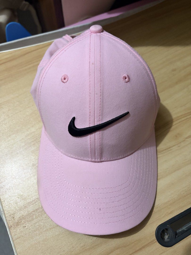 Nike Pink Cap (Category: Caps & Hats) located in Makati City. Submitted by blackxmilk (Listing ID 1469625612, Image 1). Description: .