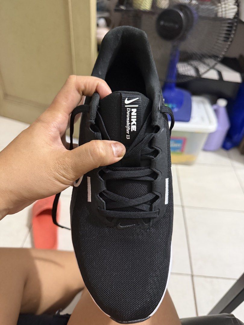 Nike Running Shoes (Category: Sneakers) located in Manila. Submitted by mne.online.shop (Listing ID 1469698116, Image 3). Description: - Brand/Model: Nike Downshifter 13 - Color: Black and White - Style Code: FD6454-001 - Size: US 10 / UK 9 / EUR 44 / 28 cm - Features: Lightweight mesh upper, cushioned white midsole, clean tread - Condition: Ready to wear for gym workouts or daily jogs.