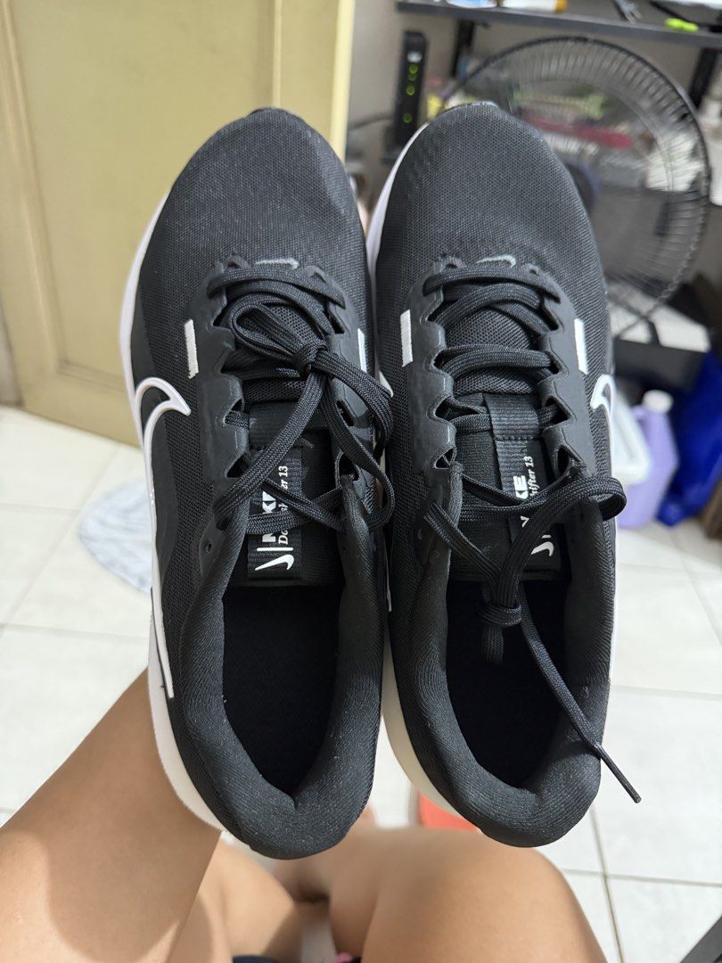Nike Running Shoes (Category: Sneakers) located in Manila. Submitted by mne.online.shop (Listing ID 1469698116, Image 1). Description: - Brand/Model: Nike Downshifter 13 - Color: Black and White - Style Code: FD6454-001 - Size: US 10 / UK 9 / EUR 44 / 28 cm - Features: Lightweight mesh upper, cushioned white midsole, clean tread - Condition: Ready to wear for gym workouts or daily jogs.