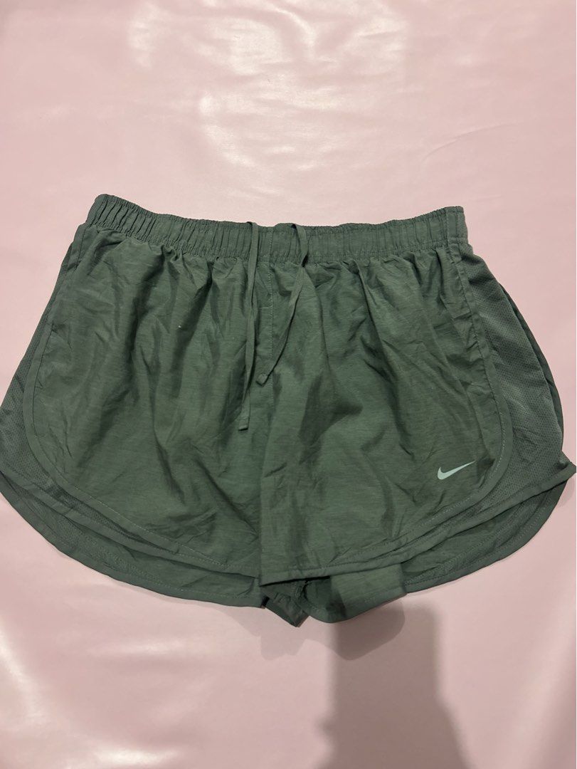 Nike Running Short (Category: Activewear) located in Manila. Submitted by chen_clybelles (Listing ID 1469709496, Image 1). Description: with paint dots on lining - see 3rd pic.