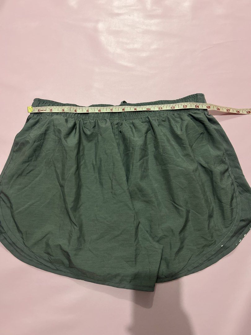 Nike Running Short (Category: Activewear) located in Manila. Submitted by chen_clybelles (Listing ID 1469709496, Image 3). Description: with paint dots on lining - see 3rd pic.