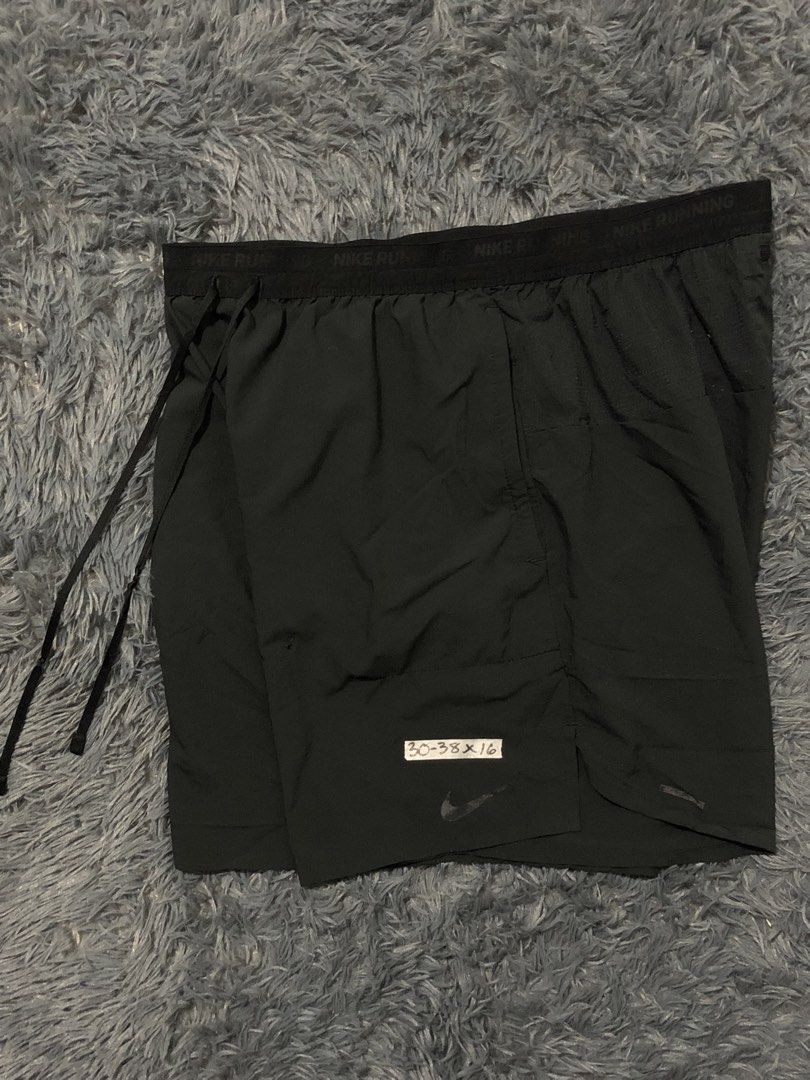 Nike Running Short (Category: Shorts) located in Manila. Submitted by raremountain00 (Listing ID 1469751116, Image 1). Description: Authentic Excellent condition Issue check last picture.