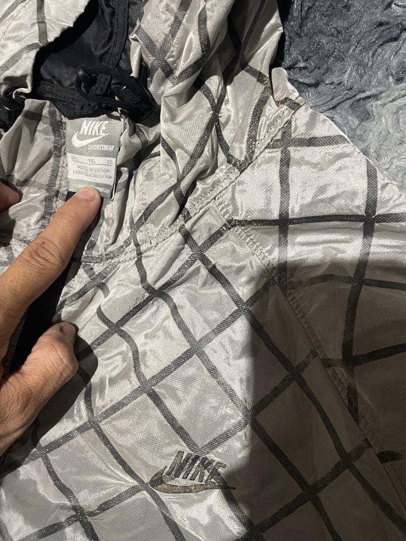 Nike Running Windbreaker Jacket (Category: Activewear) located in Mandaluyong City. Submitted by _yuujjj (Listing ID 1469694005, Image 2). Description: NIKE RUNNING WINDBREAKER JACKET SIZE – XL WIDTH – 23 LENGTH - 27 PRICE: 350.