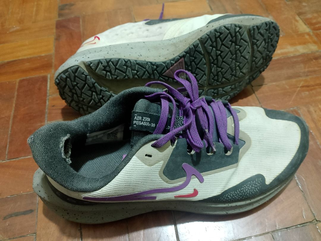 Nike Shoes Size US 7 (Category: Sneakers) located in Quezon City. Submitted by ivriory.wolfie (Listing ID 1469674244, Image 2). Description: Brand: Nike Colorway: White, dark grey, and purple with purple laces Size: US 7 / UK 4.5 / EUR 38 / CM 24 Condition: Significant wear and fabric holes on the inner ankle collar lining of both shoes; outsoles still have good traction Ideal Use: Great daily beaters or outdoor running trainers Still good shoes 