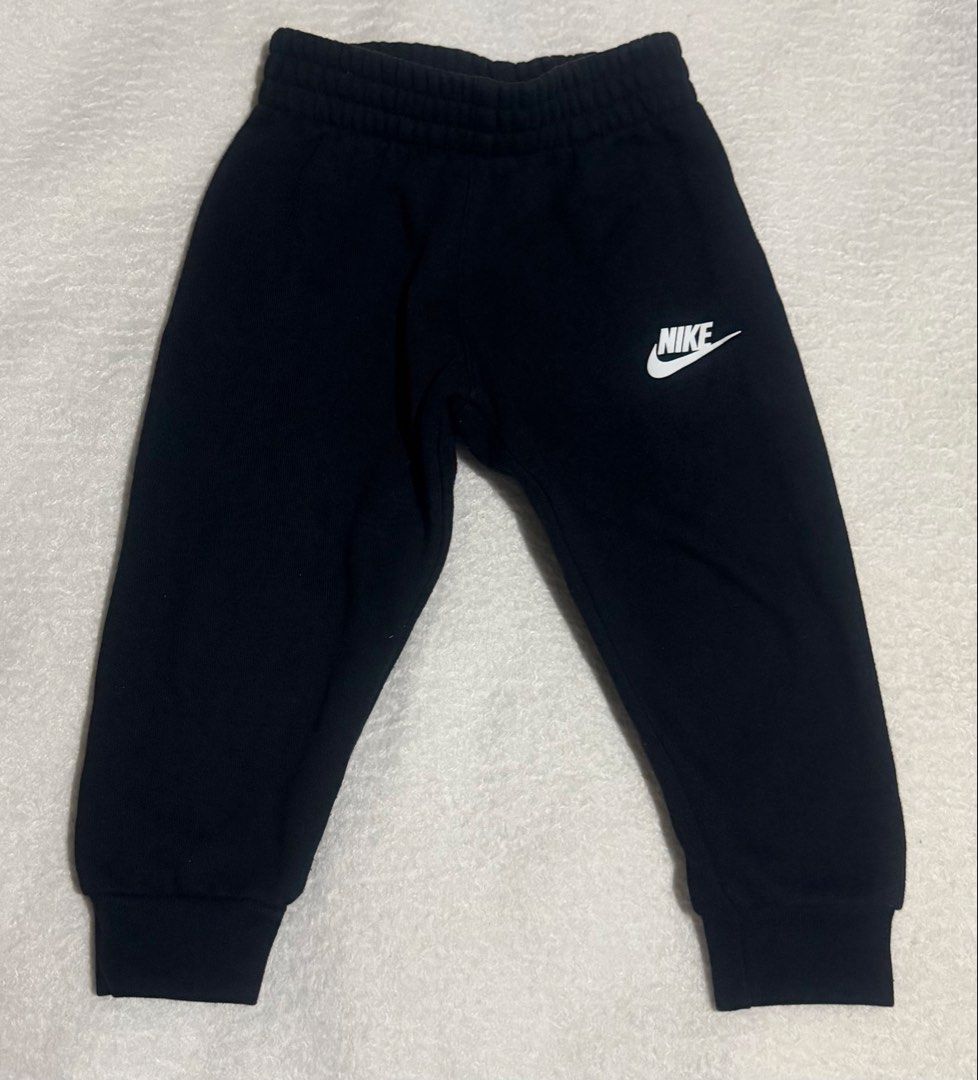 Nike Toddler Black Sweatpants Size 2T (Category: Babies & Kids Fashion) located in Mandaluyong City. Submitted by michgrayb.Enterprise (Listing ID 1469718155, Image 1). Description: Nike sweatpants in classic black. Size 2T, fits toddlers 1 to 2 years old, Elastic waistband and ribbed cuffs at ankles. White Nike logo printed on left thigh. Made in Vietnam. cotton and polyester blend fabric..
