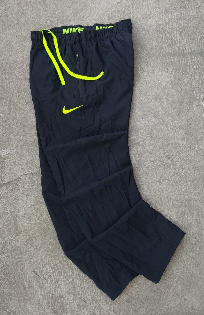 Nike Trackpants Neon Green Volt Swoosh (Category: Joggers) located in Manila. Submitted by gowicollection28 (Listing ID 1469659065, Image 1). Description: Waist: 30-38 (stretchable/adjustable) Length: 40.