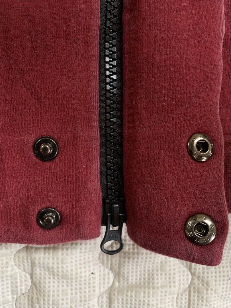 Nike Varsity Jacket Maroon Burgundy Size M (Category: Coats, Jackets and Outerwear) located in Manila. Submitted by homeroabro81890 (Listing ID 1469632638, Image 3). Description: - Brand: Nike - Style: Varsity jacket - Color: Maroon / Dark burgundy - Size: Medium - Closure: Zip front with snap button overlay - Pockets: One chest zip pocket and two lower front pockets - Details: Ribbed collar, cuffs, and hem with clean Nike red tag.