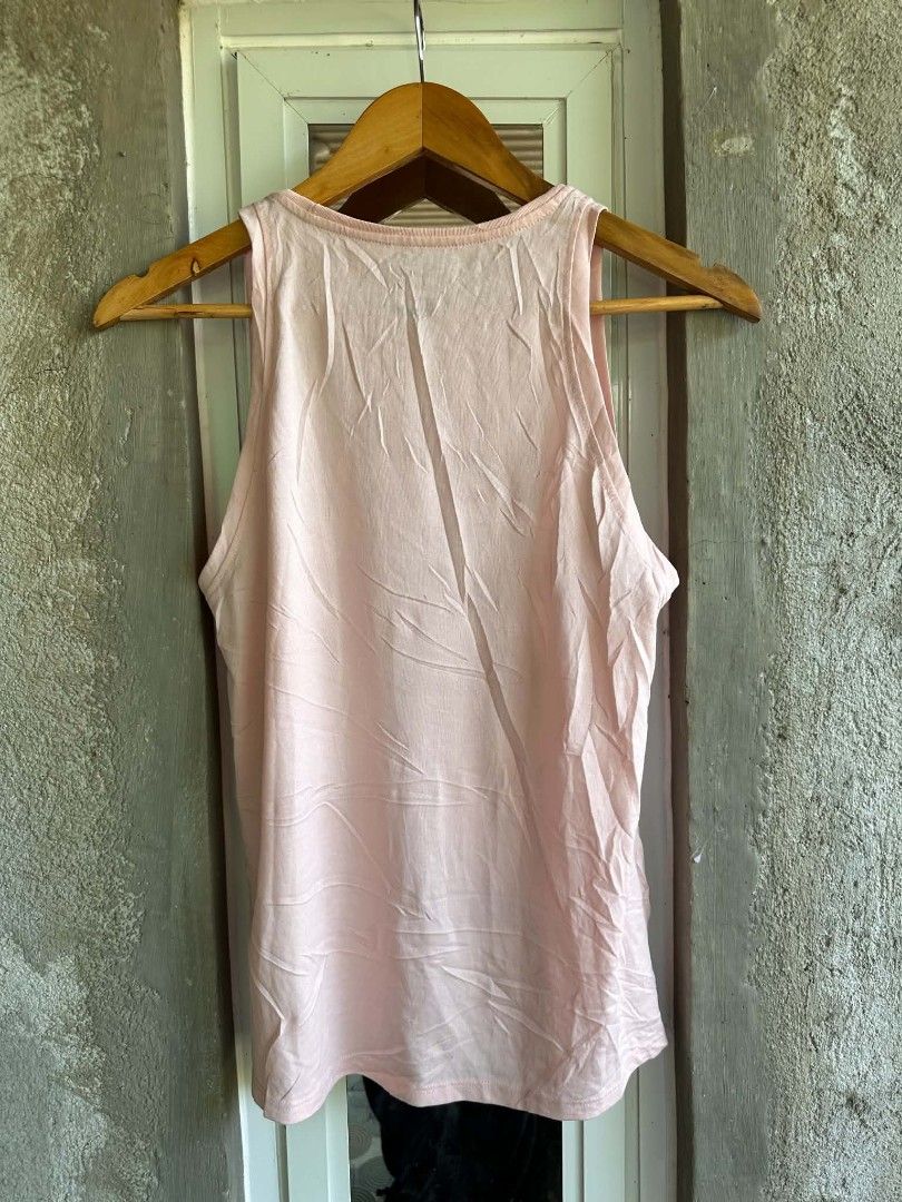 Nike women's running Drifit singlet (Category: Activewear) located in Tayug. Submitted by pabilidamitngpatay (Listing ID 1469676142, Image 3). Description: small on tag as new condition no flaws.