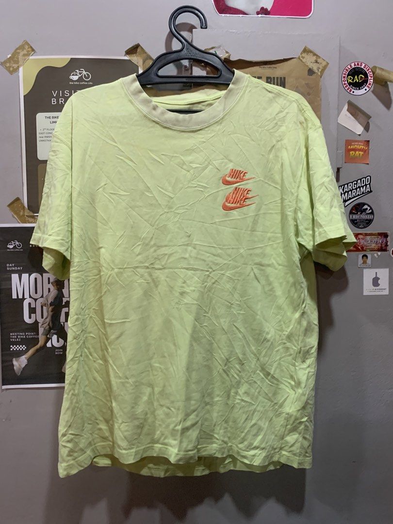 Nike World Tour Lime Green Tee Medium (Category: Tshirts & Polo Shirts ) located in Cagayan de Oro. Submitted by agboysalis60090 (Listing ID 1469742689, Image 1). Description: Light lime green Nike World Tour t-shirt in men's size medium. Double stacked Nike logo embroidered on the chest in orange. Large orange Nike World Tour graphic on the back with multiple city listings printed underneath. 100 percent cotton material. Made in China. Standard 