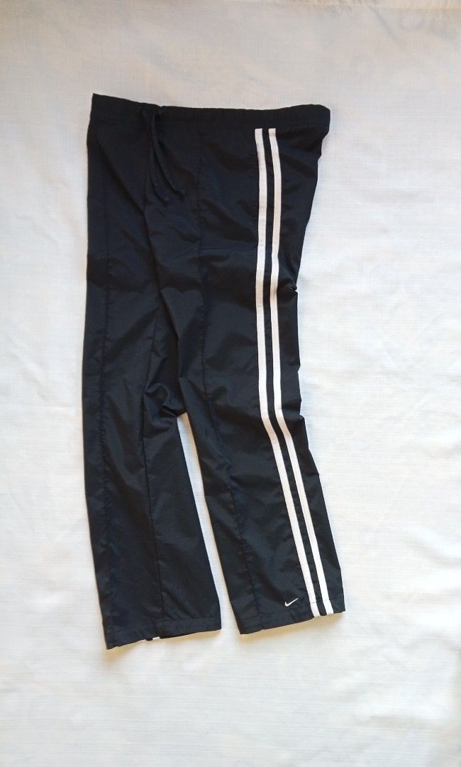 Nike y2k trackpants 2 stripes for her (Category: Activewear) located in Bagabag. Submitted by thrift_stories96 (Listing ID 1469709726, Image 1). Description: Nike y2k trackpants 2 stripes for her Xs on tag fits medium frame Waistline - 28 to 32 Length - 37 Leg opening - 8.5 Condition - 9/10 Color and cloth - 9.5/10 Flaw - fine lints sa upper 2 lines stripe,not noticeable..