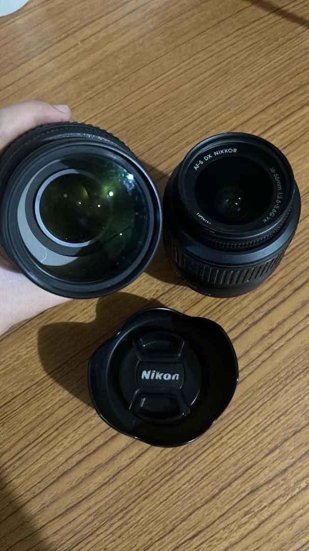 Nikon Camera (sd card cap lang po missing) (Category: Cameras) located in Muntinlupa City. Submitted by asdfghjkllllll (Listing ID 1469671398, Image 2). Description: Nikon Camera 📷Nikon D3100 with 18-55mm & 55-300mm Dslr Camera for ₱12,500 (negotiable) 🎥14.2mp 1080P HDvideo Recording Liveview 3.0 LCD Dslr camera📷 📍Slightly used perfect condition 📍used for hobby only very presentable 📍Issue is the SD card Cap and Vignette on screen but never