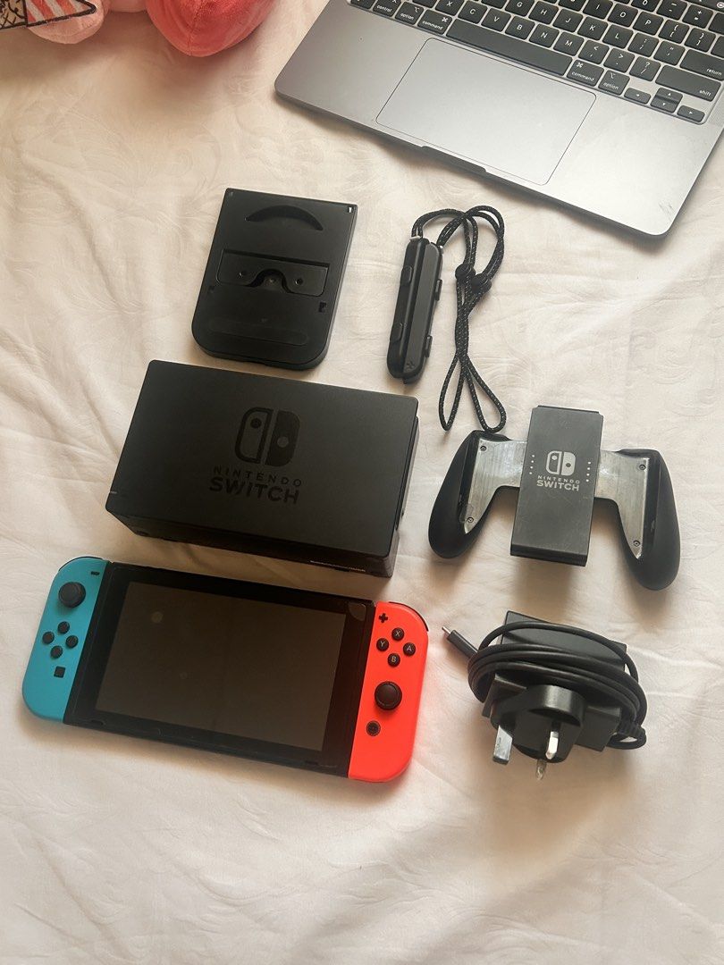 Nintendo Switch 1 V2 — no issues / NEGOTIABLE (Category: Nintendo) located in Manila. Submitted by kashrain (Listing ID 1469659507, Image 1). Description: Nintendo Switch 1 V2 — no issues / NEGOTIABLE CONDITION & DETAILS: All Authentic Fully working, no known issues — no drift, no deadpixels No scratches/dents Original Blue and Red Joy-Cons Not Jailbroken NO BOX Just bubbles on the screen protector hehe INCLUSIONS: Nintendo Switch Console Origina