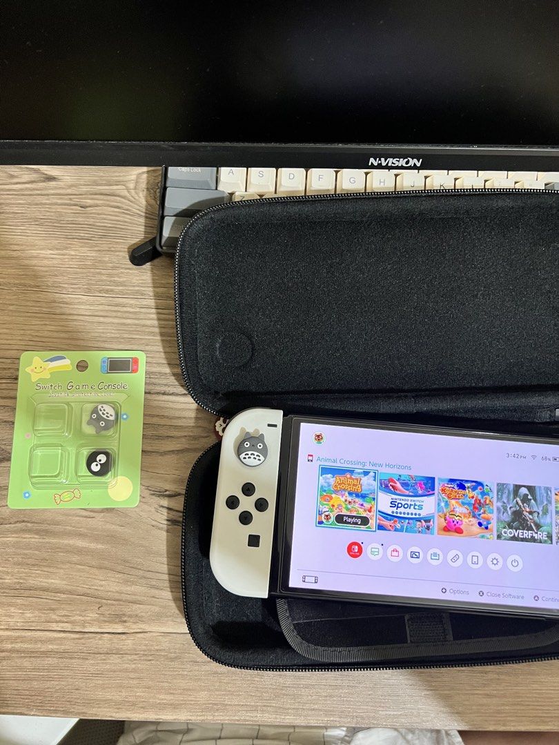 Nintendo Switch OLED No games (Category: Nintendo) located in San Jose del Monte. Submitted by seiji.notebook (Listing ID 1469755835, Image 1). Description: - Nintendo Switch OLED Model (White) - Clean screen and Joy-Cons, fully functional - Intact standard back stand and game slot - Includes black carrying case - Comes with adorable Totoro spare joystick caps - Extra transparent covers included for added protection -Dock, HDMI and charger all or