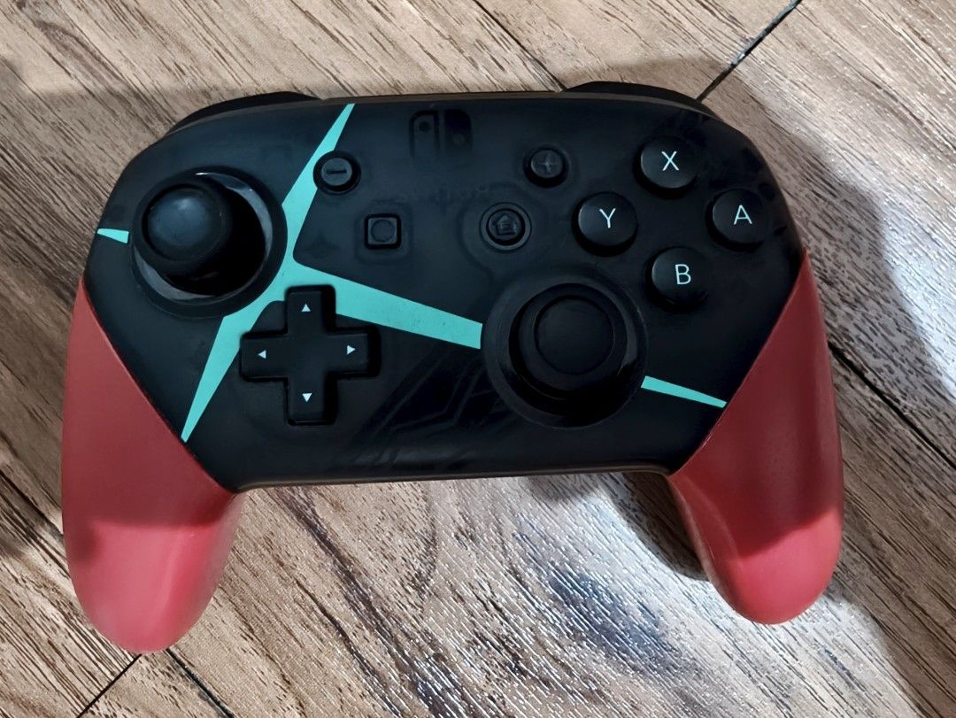 Nintendo Switch Pro Controller (Category: Controllers) located in Pasig City. Submitted by acnayb (Listing ID 1469752969, Image 1). Description: - Xenoblade shell design - No issues Loc: Dela Paz, Pasig .