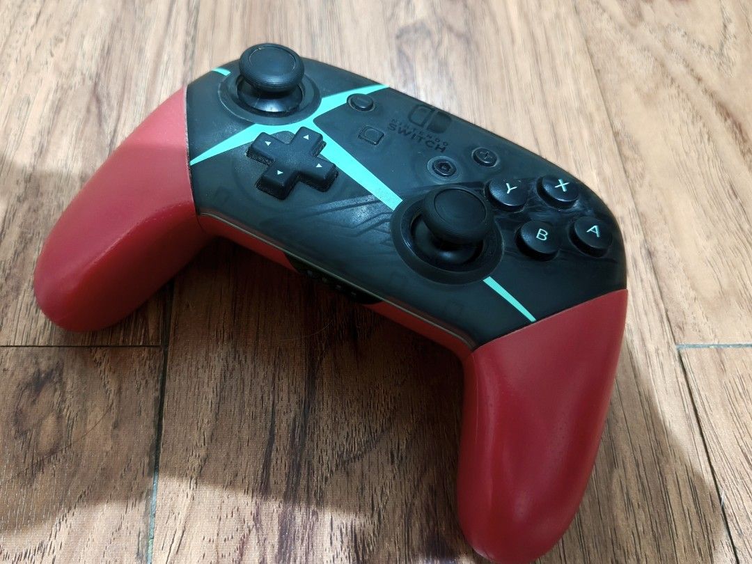 Nintendo Switch Pro Controller (Category: Controllers) located in Pasig City. Submitted by acnayb (Listing ID 1469752969, Image 2). Description: - Xenoblade shell design - No issues Loc: Dela Paz, Pasig .