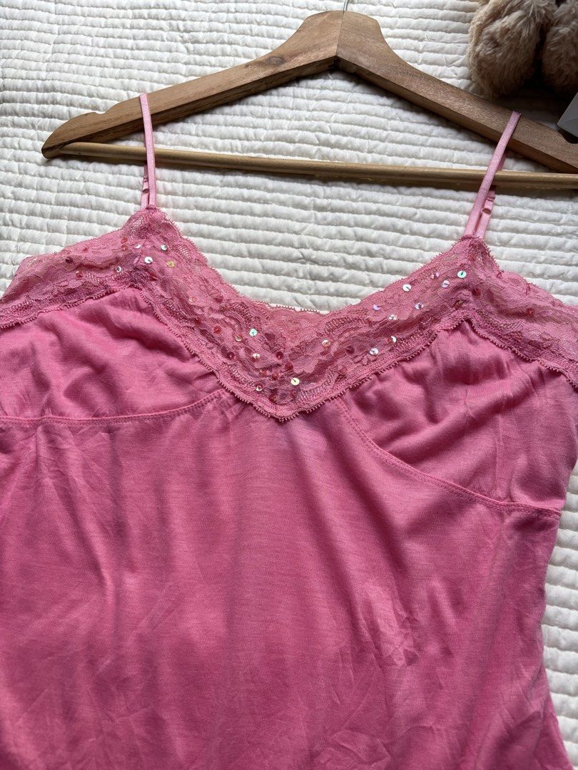 No Boundaries Pink Lace Sequin Camisole Size L (Category: Sleeveless) located in Manila. Submitted by wearme.hh (Listing ID 1469712831, Image 3). Description: - Brand: No Boundaries - Size: Juniors Large (11/13) - Material: 100% Polyester - Color: Soft pink - Features: V-neckline with delicate lace trim, sparkling sequin accents, and adjustable thin shoulder straps - Origin: Made in Cambodia.