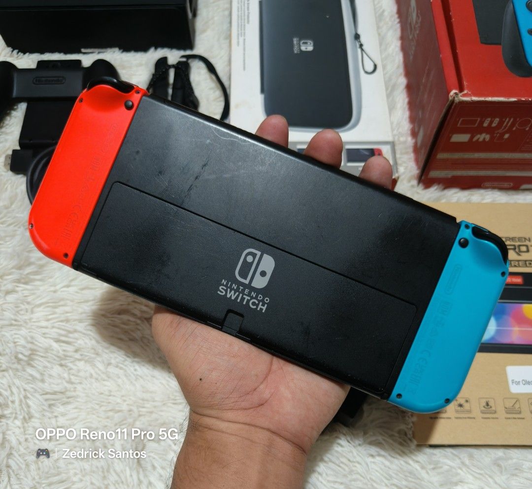 NS OLED NEON (Category: Nintendo) located in Manila. Submitted by zedricksantos (Listing ID 1469593726, Image 2). Description: FOR SALE ‼️ 🎮 Nintendo Switch Oled Neon 🎮 ⚠️ Scratches on screen & back plate ⚠️ BAWAL SA MASELAN ‼️ Complete accessories Nintendo Switch Carrying Case Tempered Glass NBA2k24 No Performance Issue 💰 9.5k Also available: (pm for pricelist) NS Oled / Lite Nintendo Switch Games SD Cards Pouch / Bags Controller ✅ Can provid