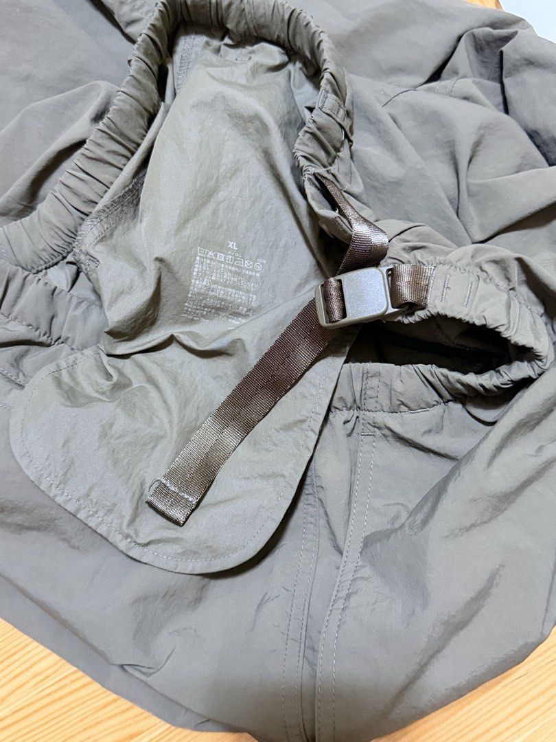 Nylon Casual Pants Brown Size XL (Category: Trousers) located in Paete. Submitted by skydruemadison (Listing ID 1469604728, Image 3). Description: - Size: XL - Color: Brown - Material: Lightweight nylon - Waist: Elastic with built-in adjustable strap and buckle closure - Fit: Relaxed through the legs with tapered ankles - Pocket: One back pocket - Condition: Excellent, clean with no stains or tears - Perfect for: Outdoor activities or daily loung