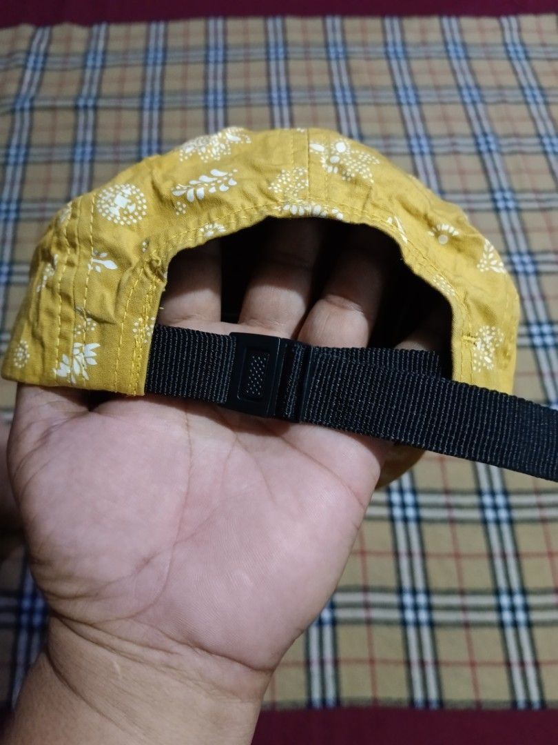 Obey Yellow Bandana Print 5-Panel Cap (Category: Caps & Hats) located in General Santos City (Dadiangas). Submitted by freehorse.5f2a61 (Listing ID 1469629708, Image 2). Description: - Brand: Obey - Style: 5-panel cap - Color/Pattern: Mustard yellow with white floral bandana print - Details: Brown stitched Obey logo patch on the front - Back Closure: Adjustable black nylon strapback with plastic buckle - Interior: Black fabric lining with yellow 