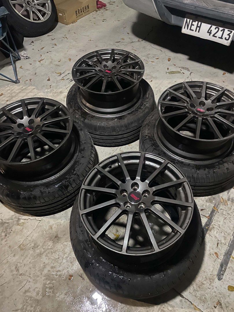 OEM Subaru STI Wheels 18x7.5 (Category: Mags and Tires) located in Manila. Submitted by pau_lus (Listing ID 1469691316, Image 1). Description: 5x100 18x7.5 +55 Orig paint Gunmetal.