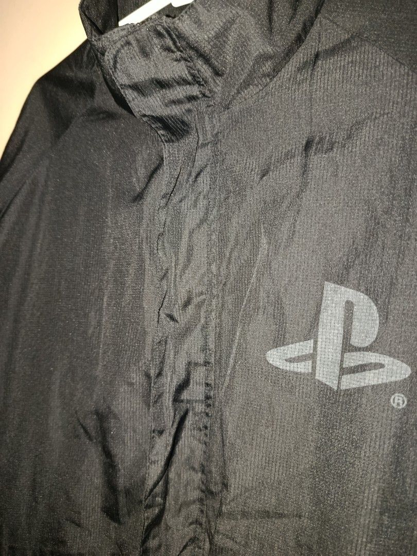 Official PlayStation Promo Windbreaker Jacket (Category: Coats, Jackets and Outerwear) located in Quezon City. Submitted by y12-baby (Listing ID 1469734161, Image 2). Description: broken pullup zip slide 5 & 6 condition: 8/10 color: 10/10 mop: gcash/maya/maribank +sf! pm for dimes RARE Vintage PlayStation Staff Jacket Y2K Sony Promo Windbreaker Not For Sale Size L.