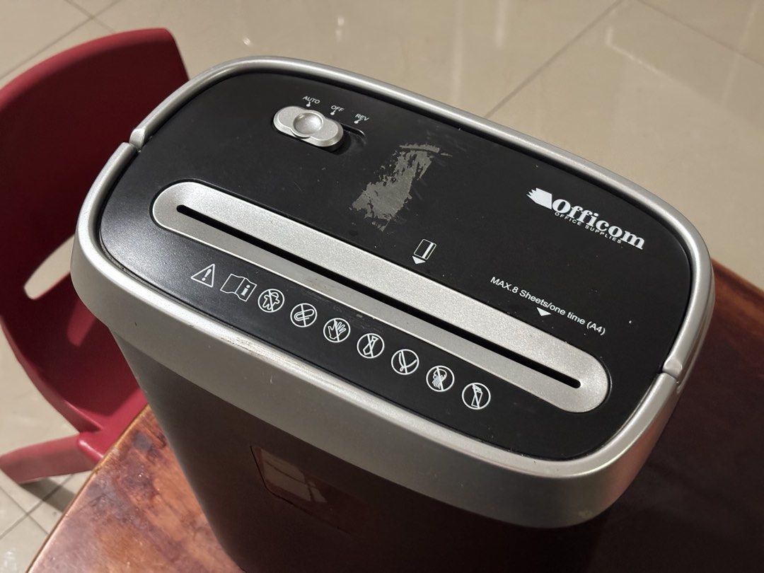 Officom Paper Shredder (Category: Office & Business Technology) located in Pasig City. Submitted by tinymommy_ (Listing ID 1469680246, Image 2). Description: 📍Pasig Greenpark Village Condition: fully functional, visible tape residue on top (can be removed).