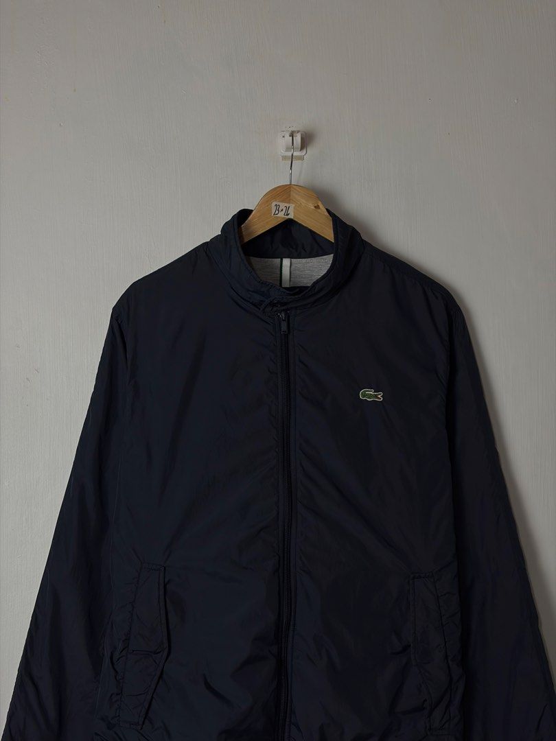 OG’ Lacoste Jacket (Category: Coats, Jackets and Outerwear) located in Manila. Submitted by vinthreads (Listing ID 1469675734, Image 3). Description: OG’ LącOst Nylon jacket Size: 52 on tag can fit to M Width: 23/ Length: 26 Prestine condition Color rate: 10/10 - Unnoticeable fabric runs and pinholes due to the material’s texture..