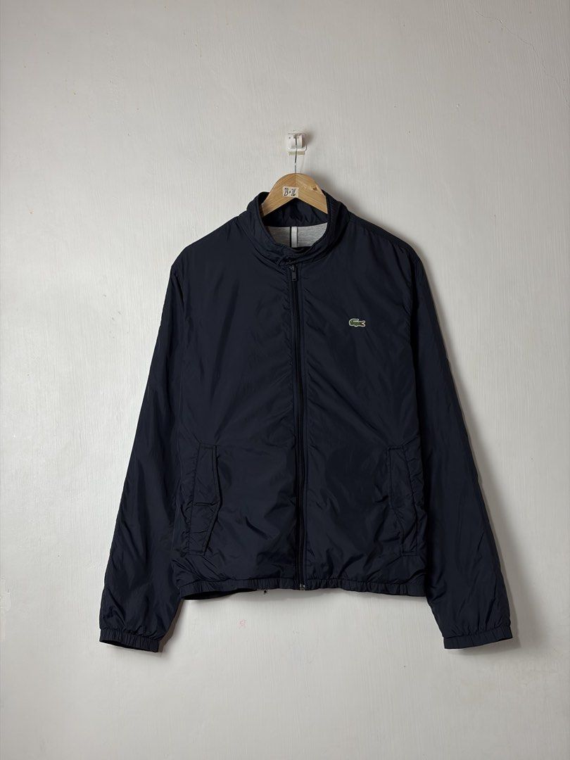 OG’ Lacoste Jacket (Category: Coats, Jackets and Outerwear) located in Manila. Submitted by vinthreads (Listing ID 1469675734, Image 1). Description: OG’ LącOst Nylon jacket Size: 52 on tag can fit to M Width: 23/ Length: 26 Prestine condition Color rate: 10/10 - Unnoticeable fabric runs and pinholes due to the material’s texture..